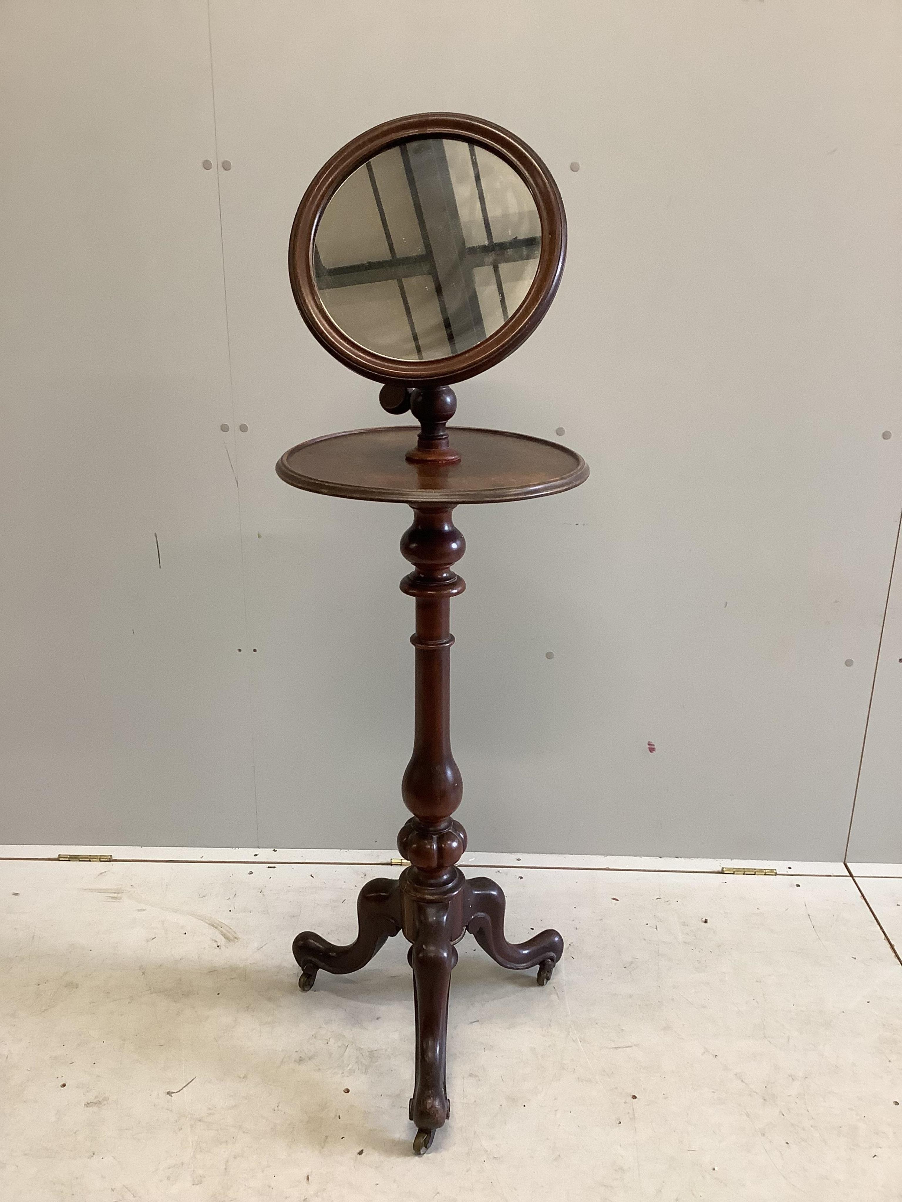 A Victorian mahogany shaving stand on carved tripod base, height 140cm. Condition - fair